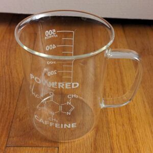 Powered by caffeine glass beaker mug like new